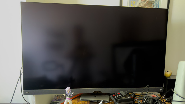 BenQ EX480UZ on a desk