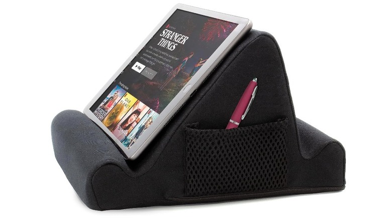 Brookstone Lap Cushion with a tablet and side pocket for accessories.