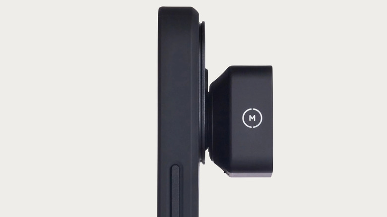 Moment lens attached to back-facing camera of iPhone