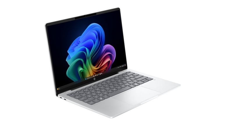 HP OmniBook 5 14-inch displaying a Windows 11 wallpaper.