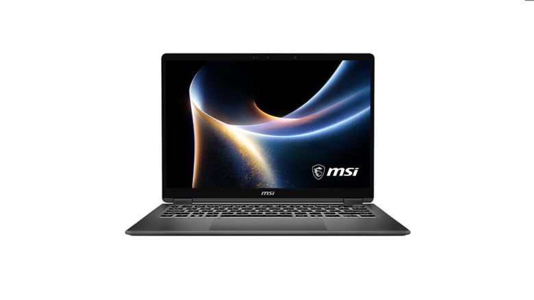 MSI Prestige 14 Flip AI Plus showing an abstract glowing wallpaper