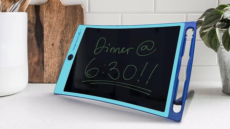 A message displayed on a Boogie Board Jot Reusable Writing Tablet on a counter