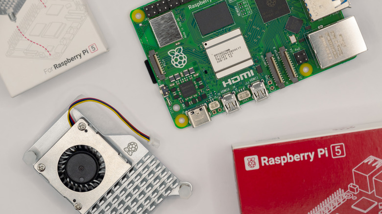Raspberry Pi 5 with accessories and a cooling fan