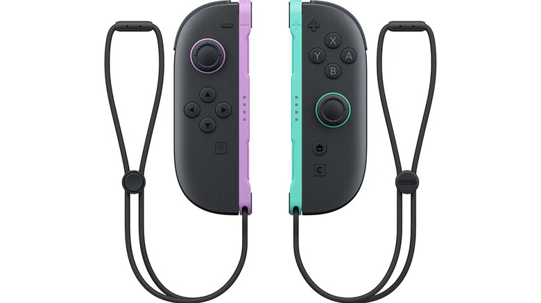Purple and green joy con on a blank background
