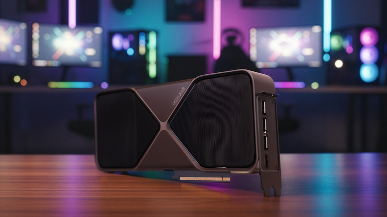 Nvidia GeForce RTX 5090 graphics card placed on a desk with RGB-lit gaming setup in the background