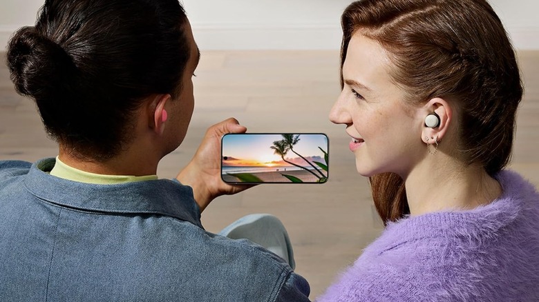 Two customers wearing Pixel Buds Pro 2s