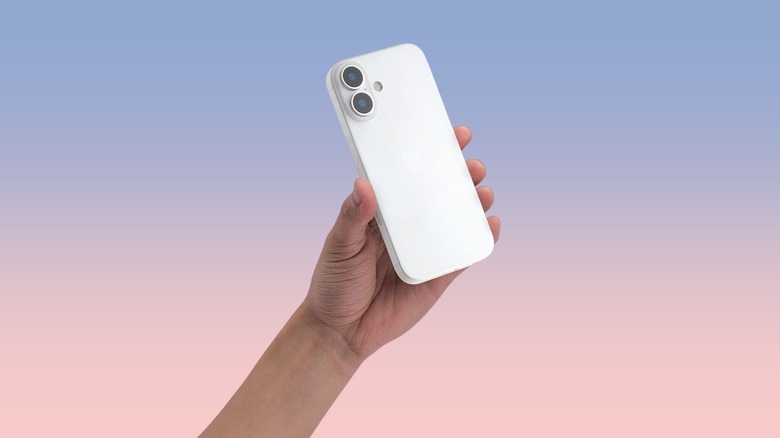A hand holding the Totallee Scarf case for the iPhone 17 against a gradient background
