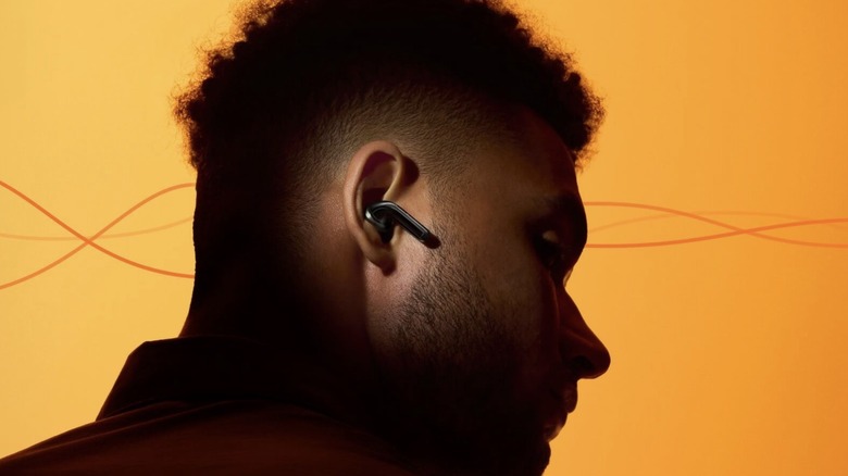 A man wearing the OnePlus Buds Pro 3.