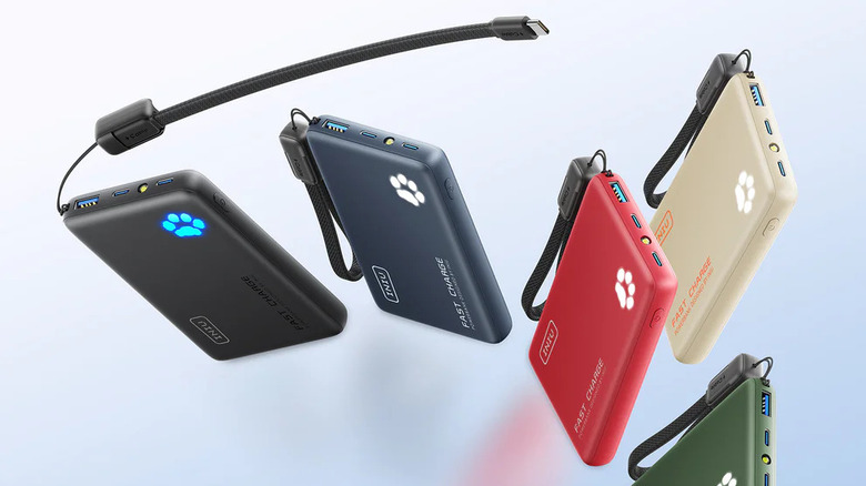 Five INIU power banks of different colors, one of which has a small USB-C cord extending from a strap