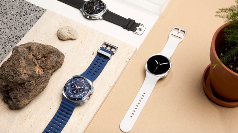 Three Samsung Galaxy watches on table
