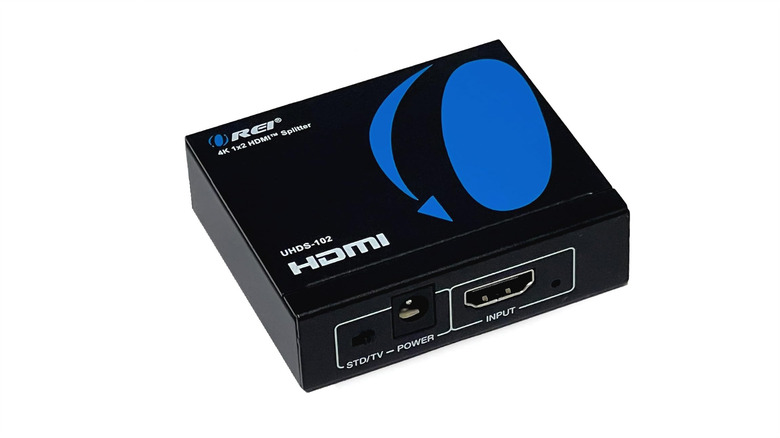 The Orei 1 in 2 out 4K HDMI splitter against a white background