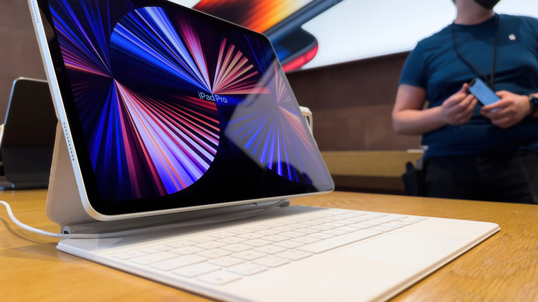 The iconic apple magic keyboard with an iPad Pro