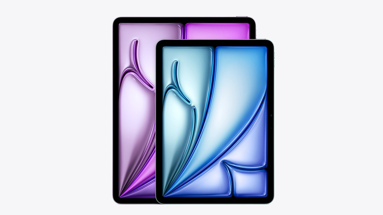 Two iPad Air tablets with blue and purple abstract wallpapers shown on a white background.