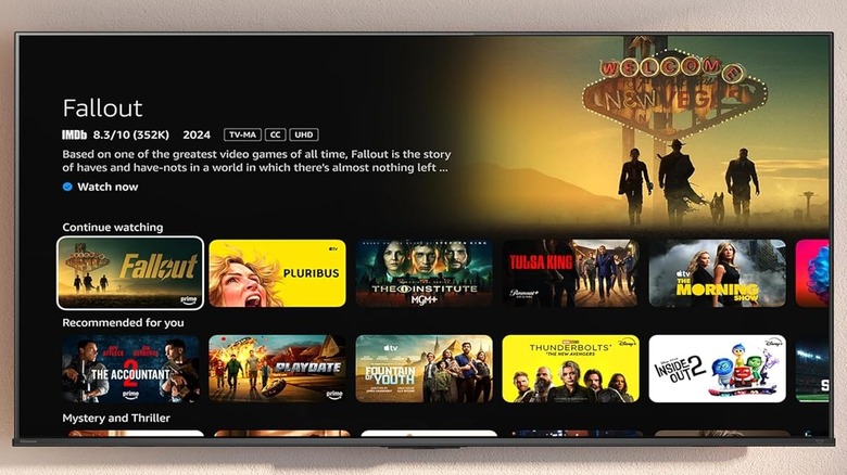 A wall-mounted Hisense U7SF Mini LED TV.