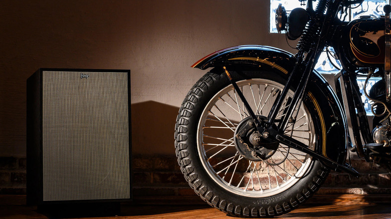 Klipsch Heresy next to bike