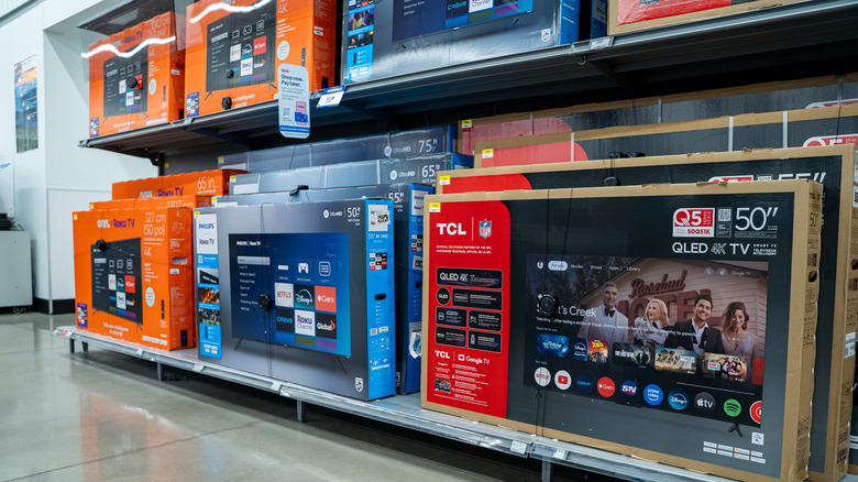 smart TVs on display in a store