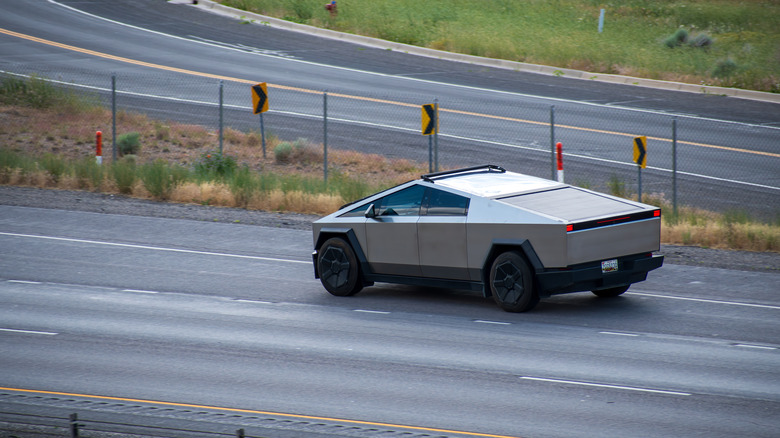 Tesla Cybertruck driving on the highway.