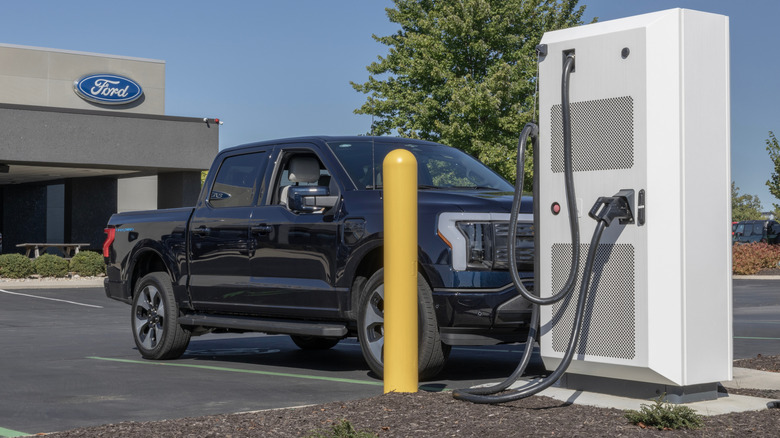 Ford F-150 Lightning at a charging station.