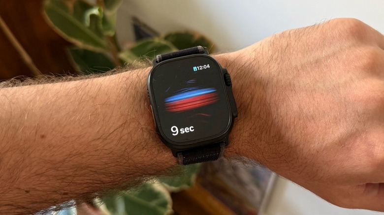 An Apple Watch performing a blood oxygen test