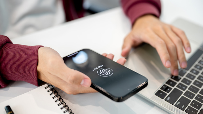 Person opening the ChatGPT app on their smartphone.