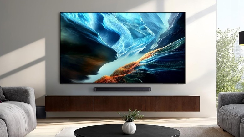 The Samsung S90H mounted to a wall in a simulated living room