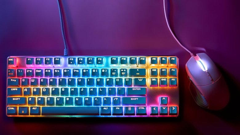 A gaming mouse and keyboard on a table