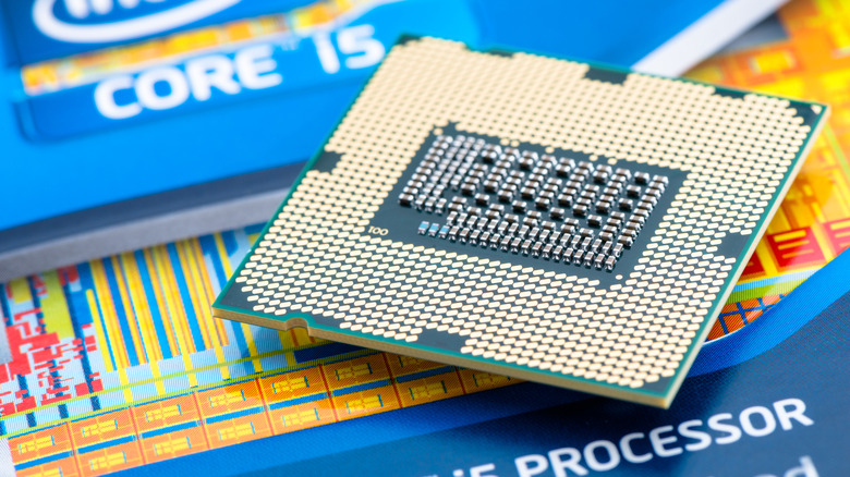 An Intel processor sitting upside down on it's box