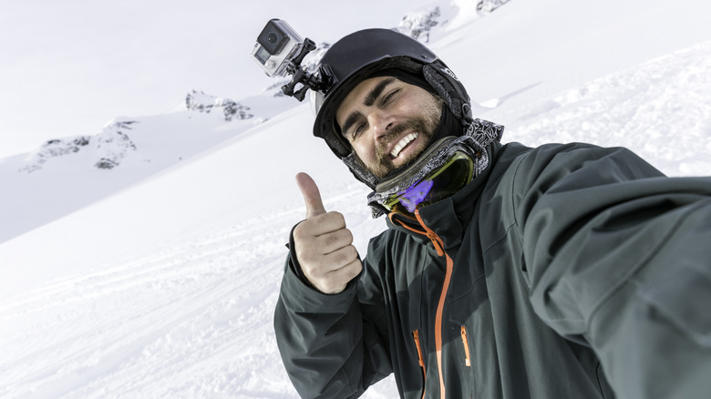 Skier, Snowboarder Taking a Selfie at the Mountain with a GoPro