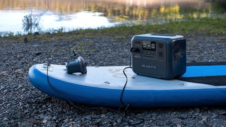 A Bluetti AC70 placed on a paddleboard