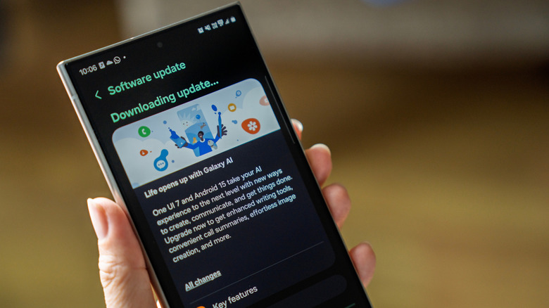 samsung phone showing latest software version updating and downloading