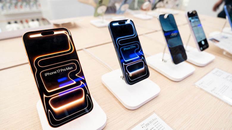 Apple iPhone 17 models on display in a row.