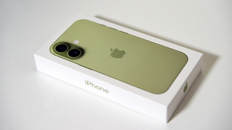 Close-up of carton box of brand new Apple iPhone 17 against white background
