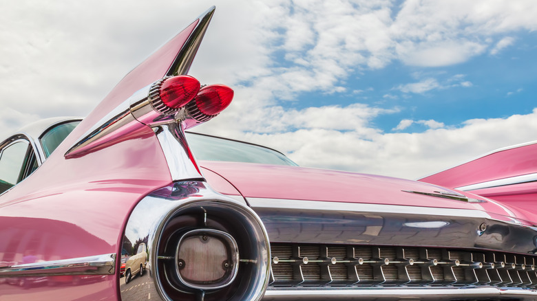 A 1960s Cadillac automobile with futuristic tail fins