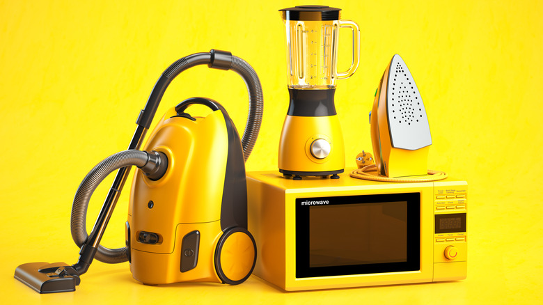 An assortment of retro tech appliances on a yellow background