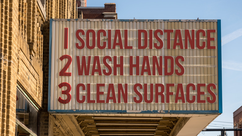 Movie billboard with Covid-19 safety rules