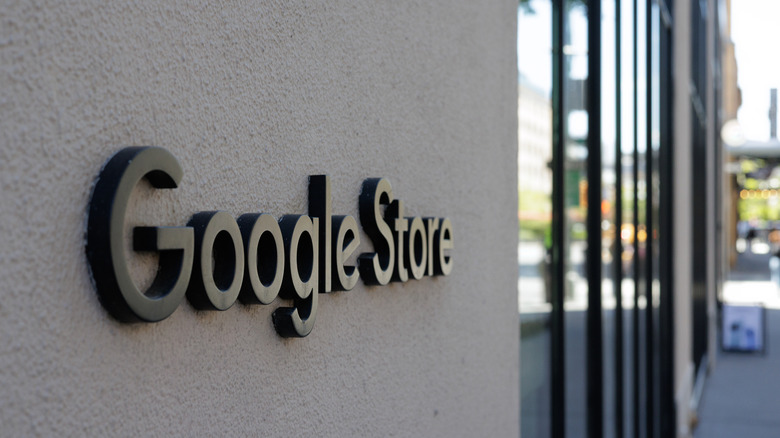 Raised metallic lettering marks the exterior entrance of a Google Store