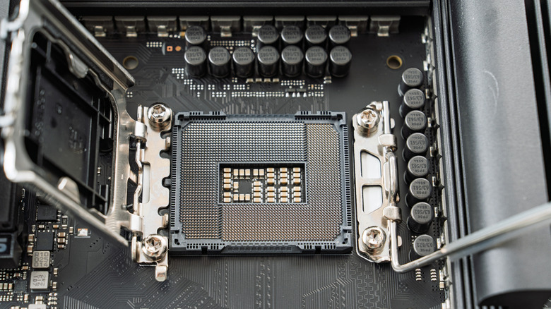 Close-up of an empty CPU socket on a Z890 motherboard with its retention bracket open.