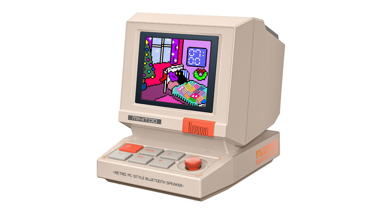 The Divoom MiniToo retro Bluetooth speaker against a white background