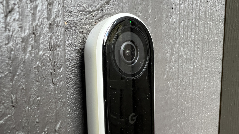 A close-up of the Ring Nest Doorbell mounted on a wall