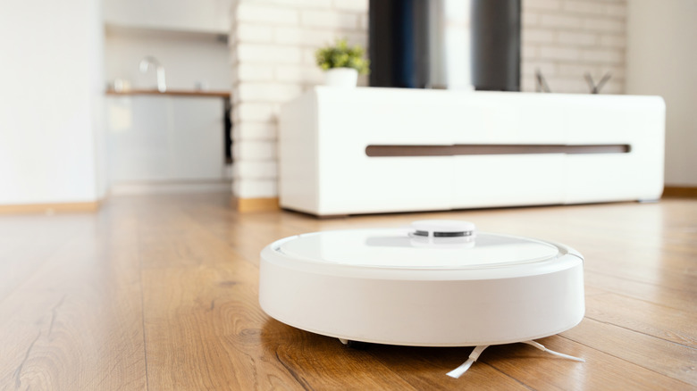 A robot vacuum cleaning the floor