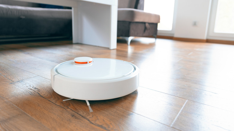 A robot vacuum cleaning the floor