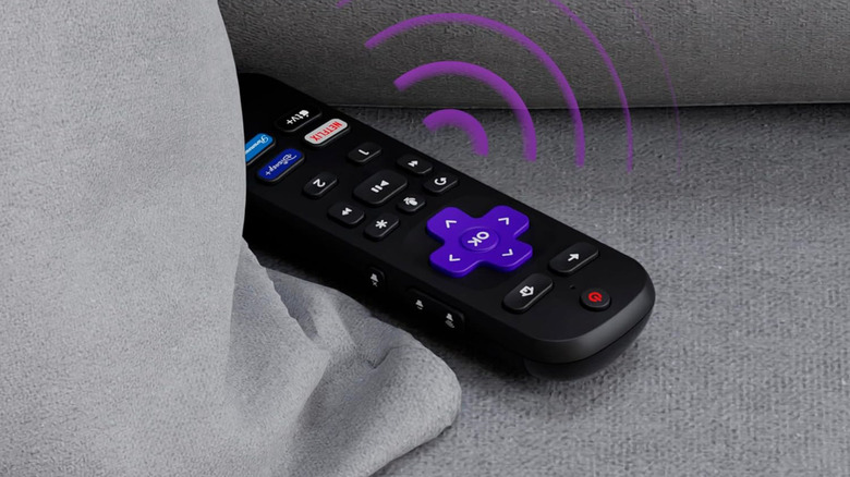 The Roku Voice Remote Pro on a sofa