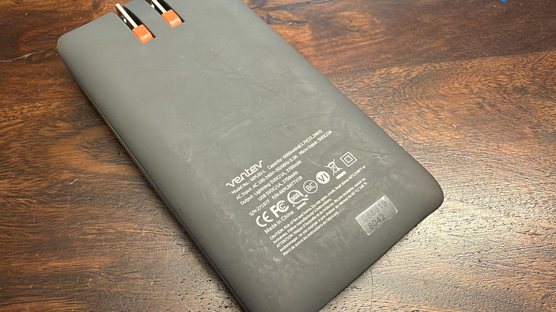 The back of a power bank showing certifications.