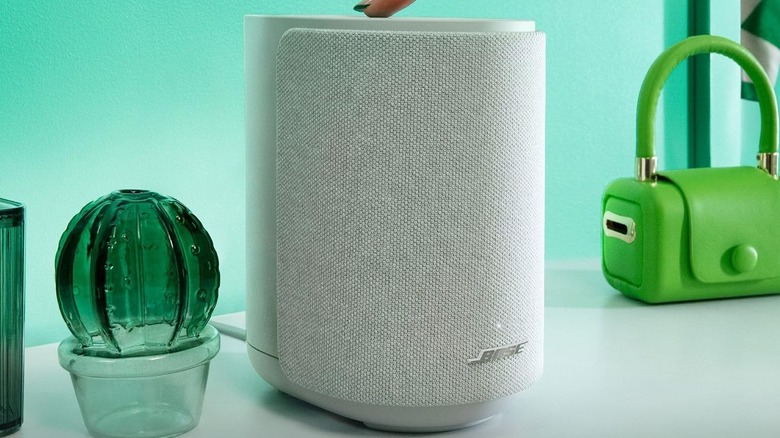The Bose Lifestyle Ultra Speaker on a marble surface.