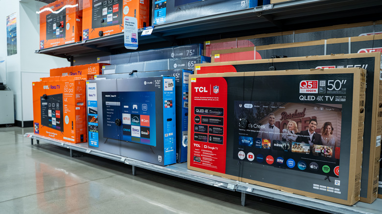 Smart TV in boxes on display at a retail store
