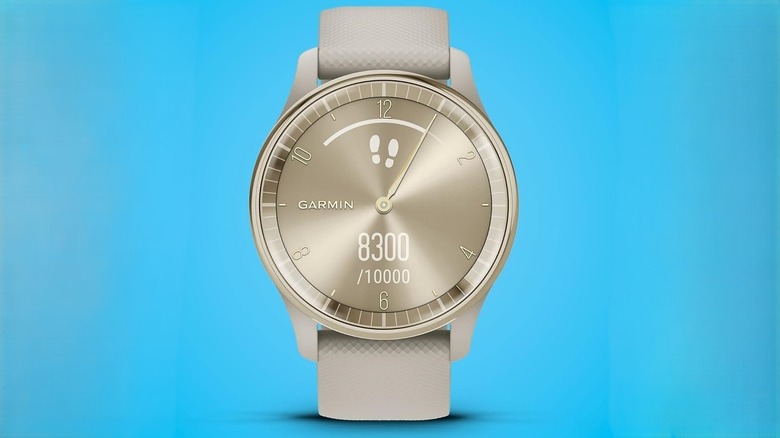 Garmin Vivomove Trend touchscreen dial display on blue background.