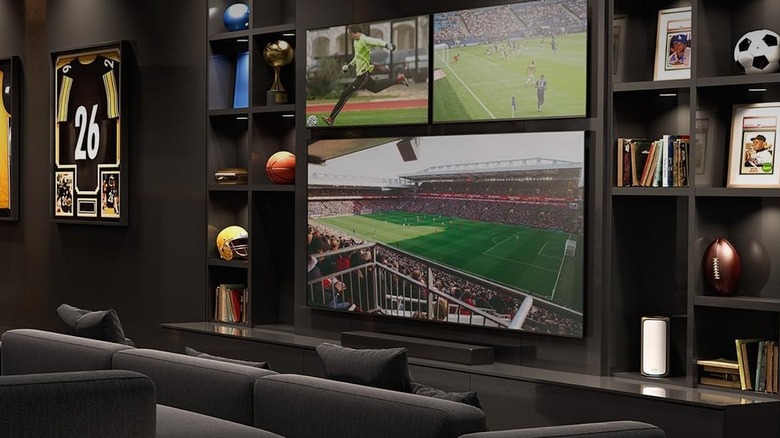 Netgear Orbi 970 Series 2026 mesh router system in sports fan room.