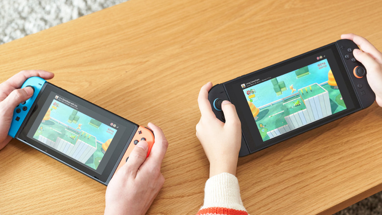 Two Nintendo Switch consoles playing a game via GameShare