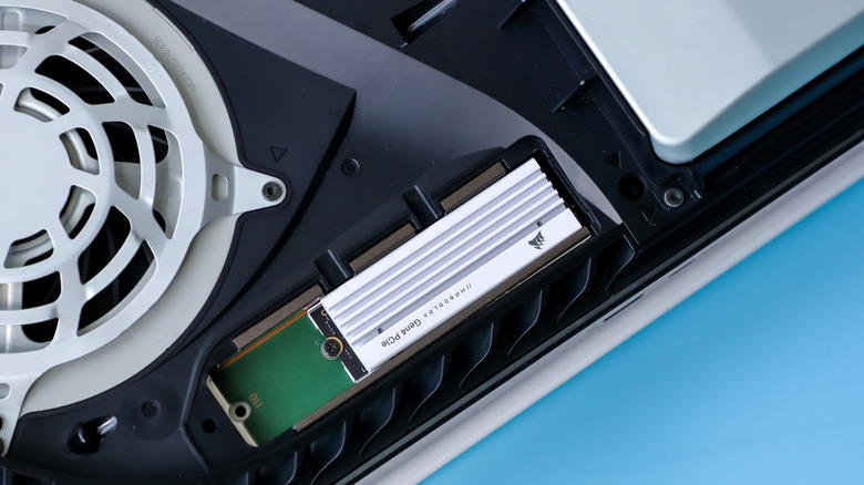 A PS5 opened up with a M.2 SSD installed