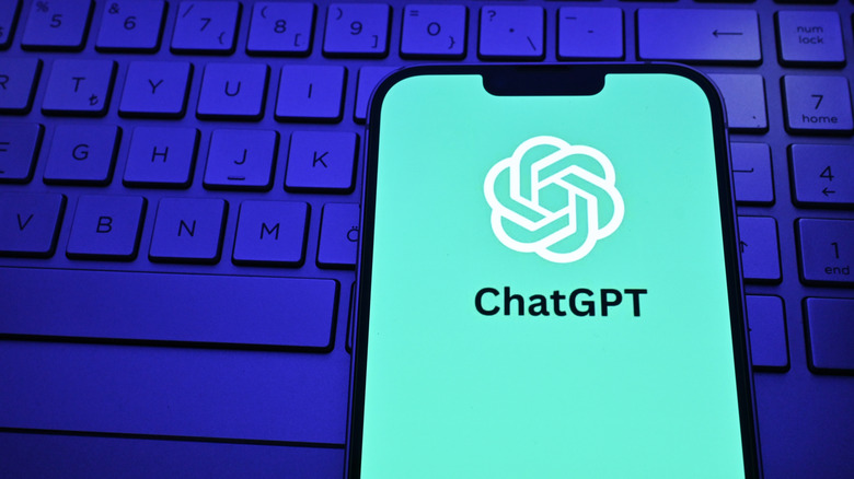 An image with the ChatGPT logo on a smartphone.
